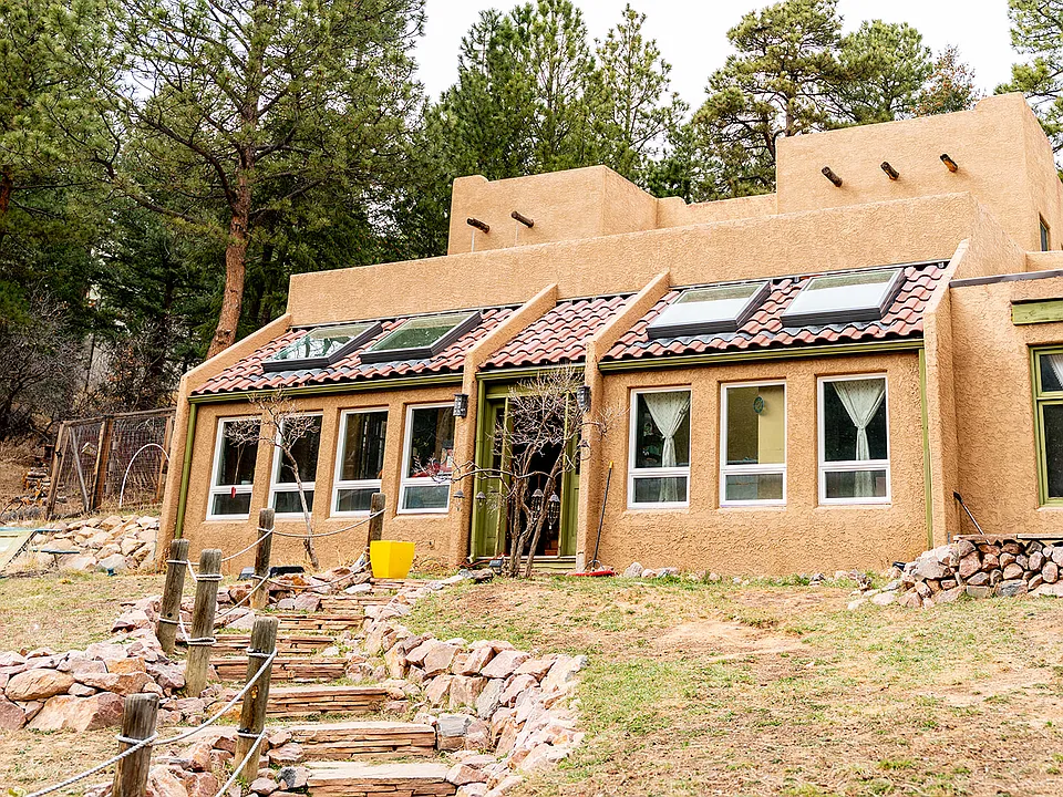 Passive solar home, facing south. Sunlights and sunroom windows.