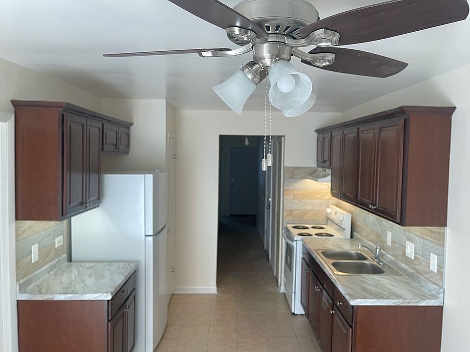 Large eat-in kitchen w/ plenty of cabinet space.