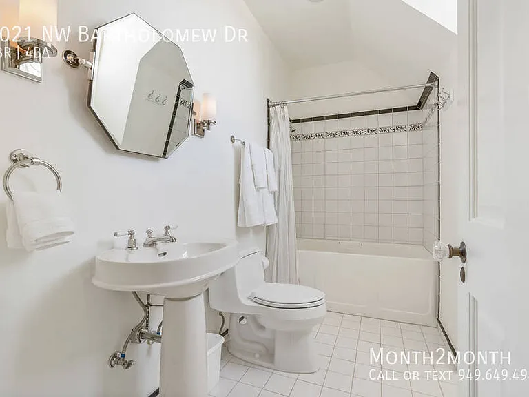 9021 NW Bartholomew Dr — Photo 29