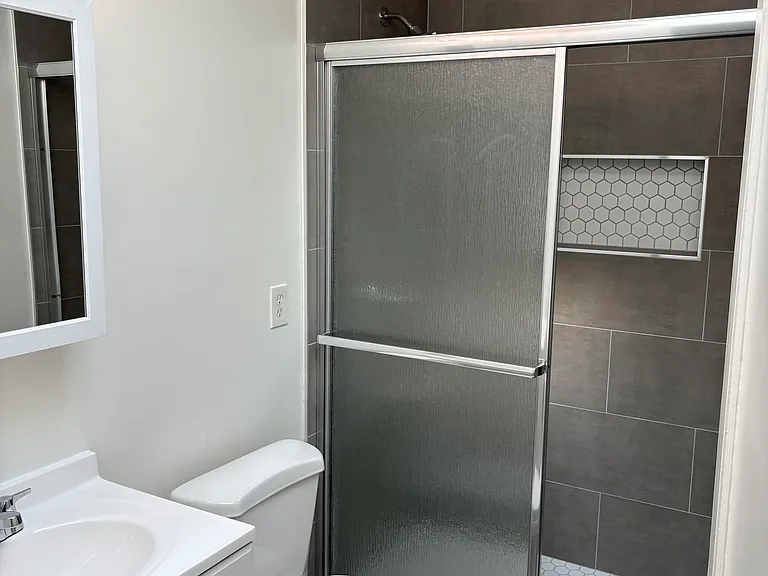 Remodeled bathroom with walk-in shower