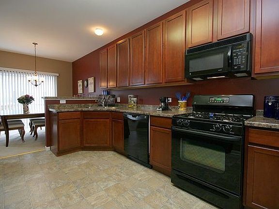 Upgraded Kitchen with all GE - Appliances & 42" Cherry Finish Cabinets