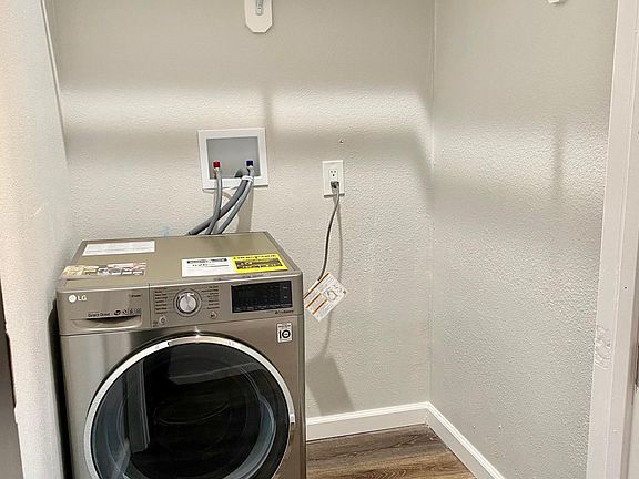 Washer/Dryer Combo Unit in Walk-in Closet