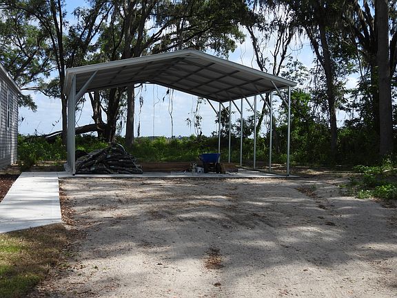 Concrete carport.
