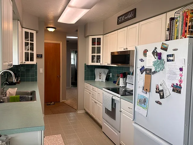 7100 Whitley Dr — Photo 8