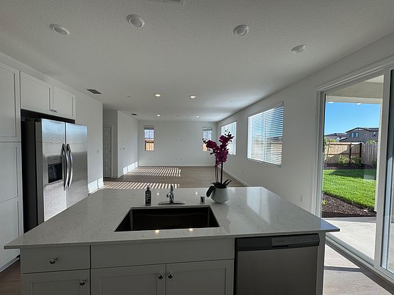 Open Kitchen with new appliances, huge island and plenty of cabinets