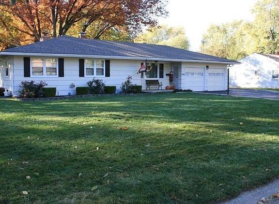 Third bath with shower in garage for outdoor cleanups.