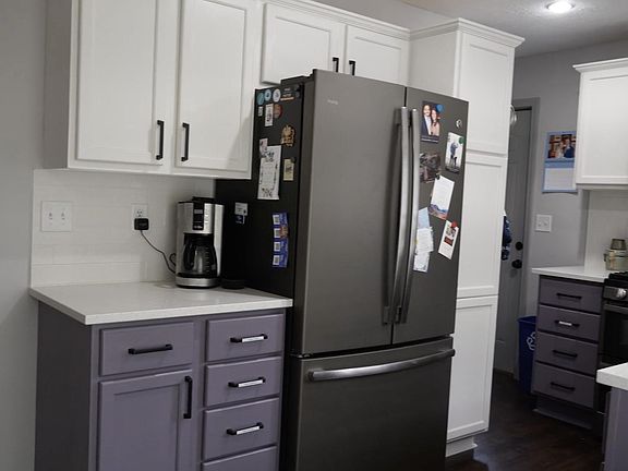 Quartz countertops, large sink, newly refinished cabinets Newer GE appliances. Double oven.