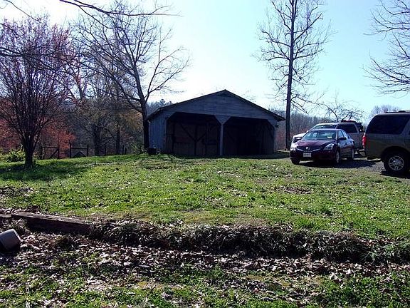 Detached free standing storage or parking shed