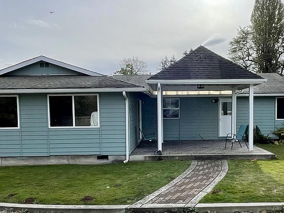 Large covered patio for year-round outdoor living _ rain or shine.