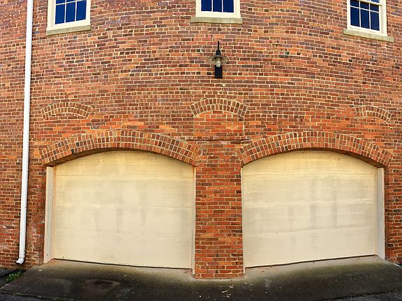 Two garage doors in the back