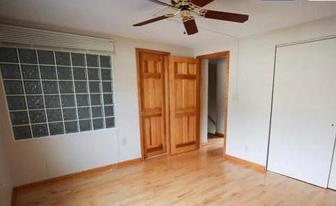 Bedroom 1 with hardwood floors