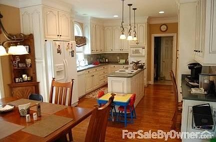Open kitchen with dining area