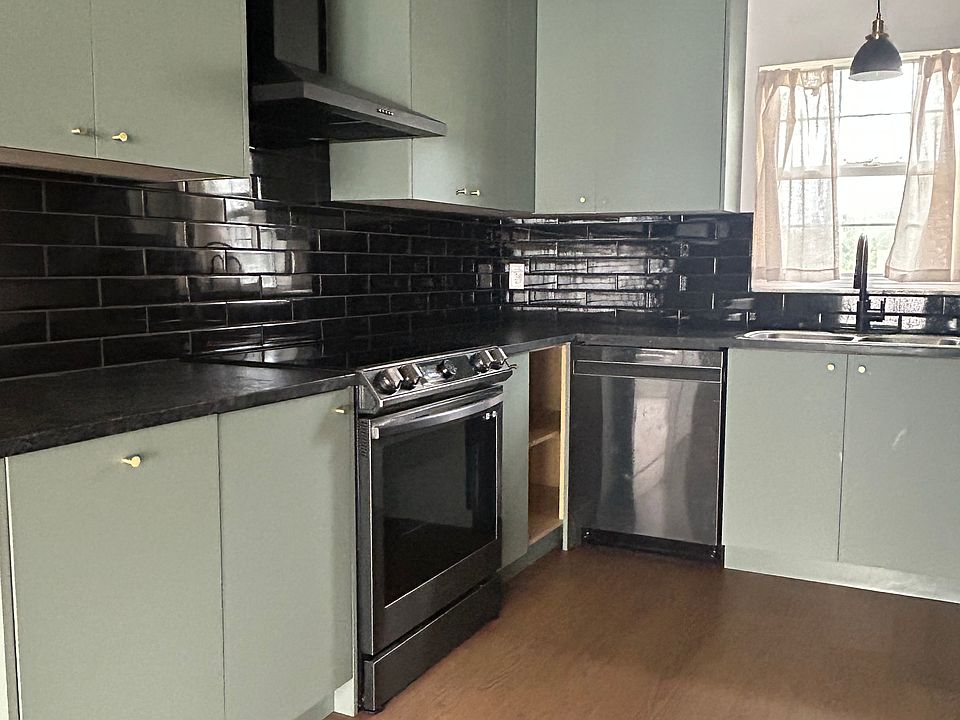 Kitchen: new dishwasher, stove, and refrigerator.