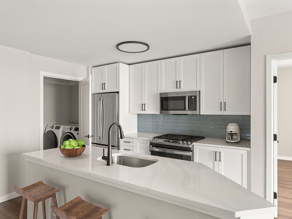 Stainless-steel appliances, Caesarstone or quartz countertops, and fully equipped kitchens elevate your cooking experience