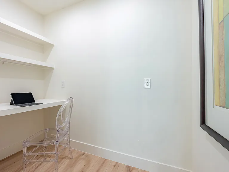 Mini study nook or reading area with shelving_perfect for remote work or homework space.