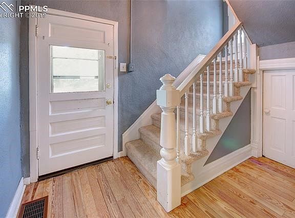 Foyer with under stair storage