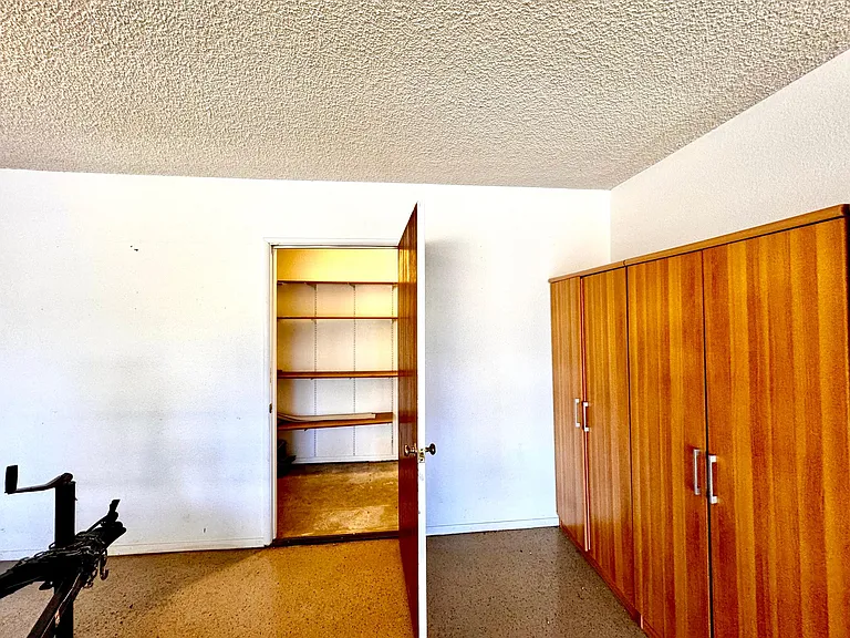 Entrance to separate storage room in garage.