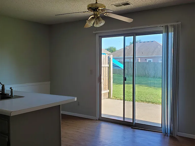 Dining area with a back patio and nice yard