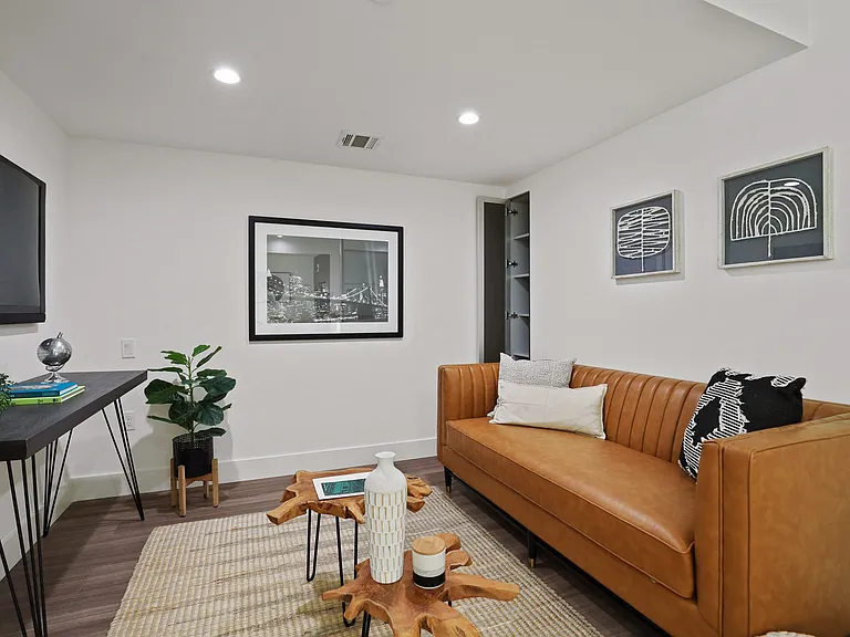 Living Rooms with Vinyl Flooring and Recessed Lighting