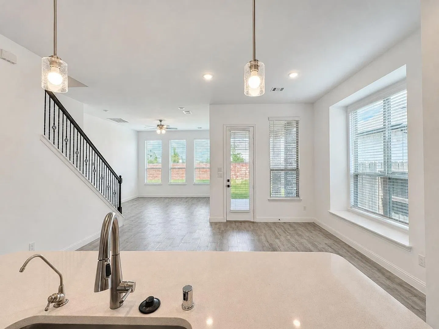 Spacious 4 Bed / 3 Bath Home with Game Room and Lawn Care Included in Sunterra — Photo 3