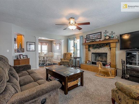 Bright, spacious living open to dining room and kitchen.