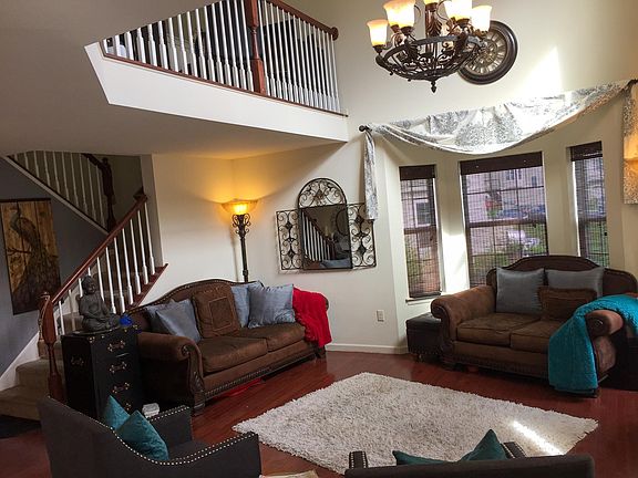 Two Level High Ceiling Living Room