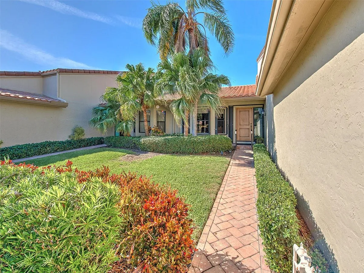 Photo 1 of 60 - 2377 Harbour Oaks Dr - Longboat Key, FL Primary Photo - 2377 Harbour Oaks Dr