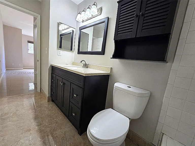 3457 NW 44th St #205 — Photo 11