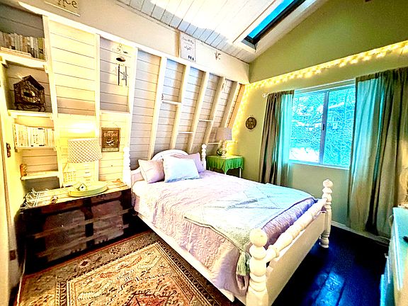 2nd Bedroom with queen bed is upstairs at the back of the house.