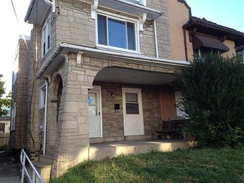 Additional front view with side alley
