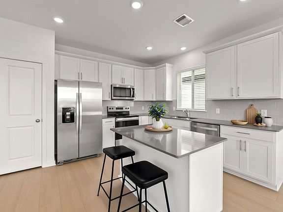 Open Kitchen with Island Bar Seating