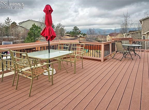 Expansive Trex deck extends the entire length of the home