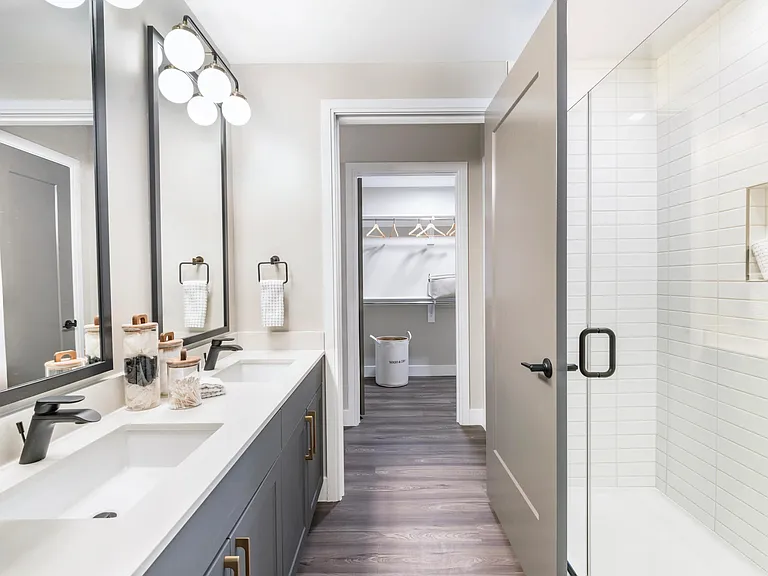 Experience spa-inspired finishes with stylish tile showers, dual vanities in select homes, and spacious walk-in closets to keep everything organized and tidy.