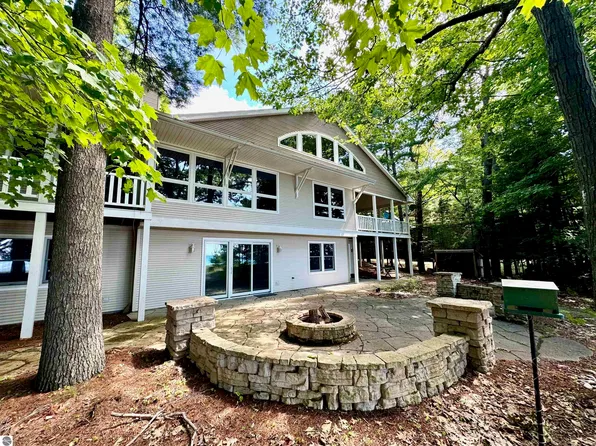 516 S Golden Beach Dr, Kewadin, MI 49648