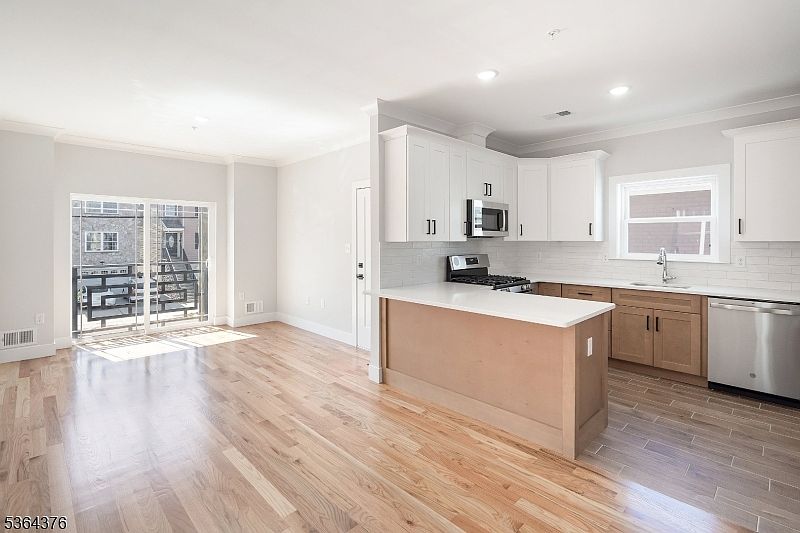 Spacious family home with kitchen and living area