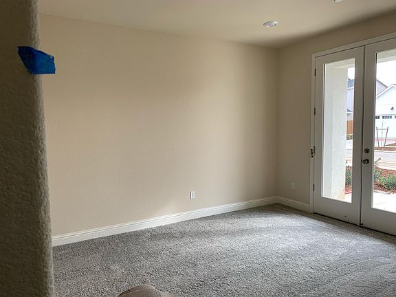 Bed room on 1st floor with double French doors