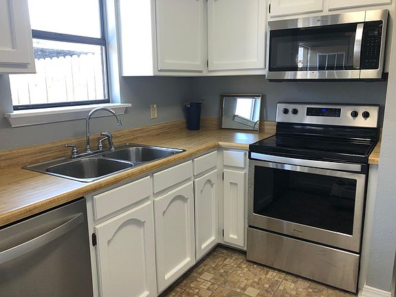 Look at this kitchen!! Kitchen has brand new Stainless Steel Appliances. Washer and dryer to stay for tenant use.