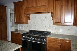 Top of the line appliances and cultured Marble backsplash 