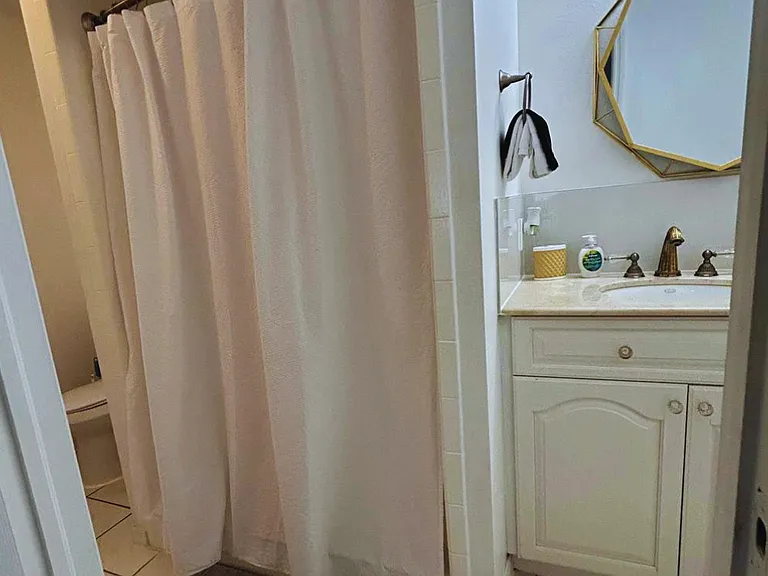 Comfortable spacious shower for a relaxing and convenient experience.