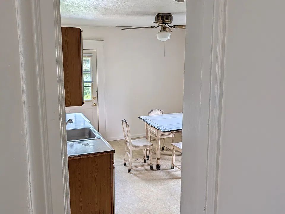 Step down into large eat in kitchen.