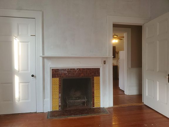 Bedroom #1 with fireplace.