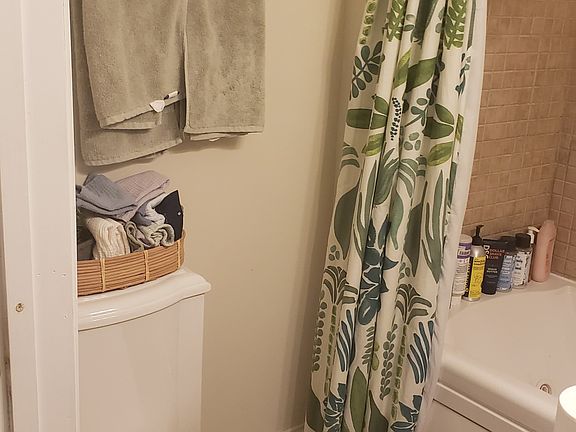 Second Floor rear bathroom with tub & tile surround