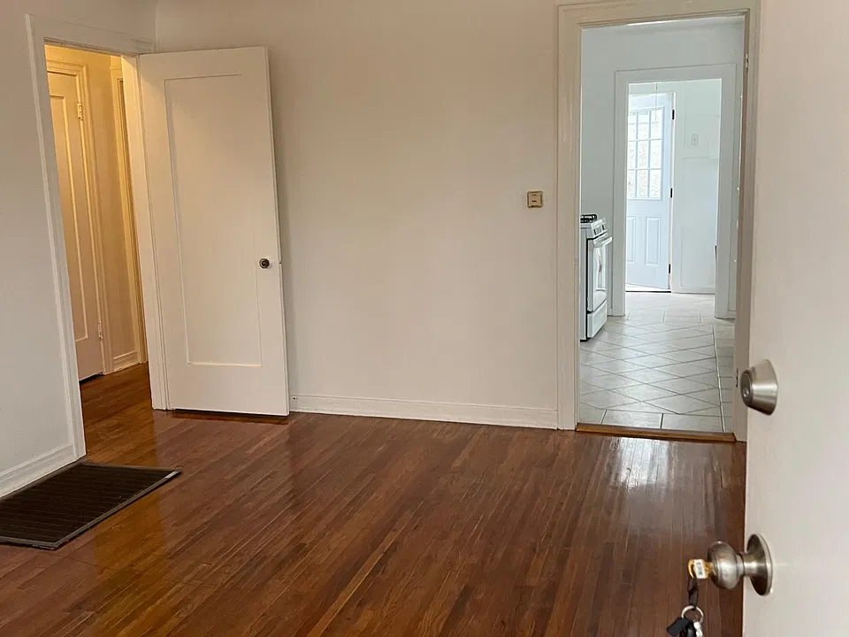 Living Room with Laminate flooring and freshly painted.
