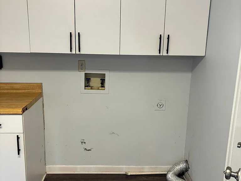 Laundry Hook ups in kitchen for convenience