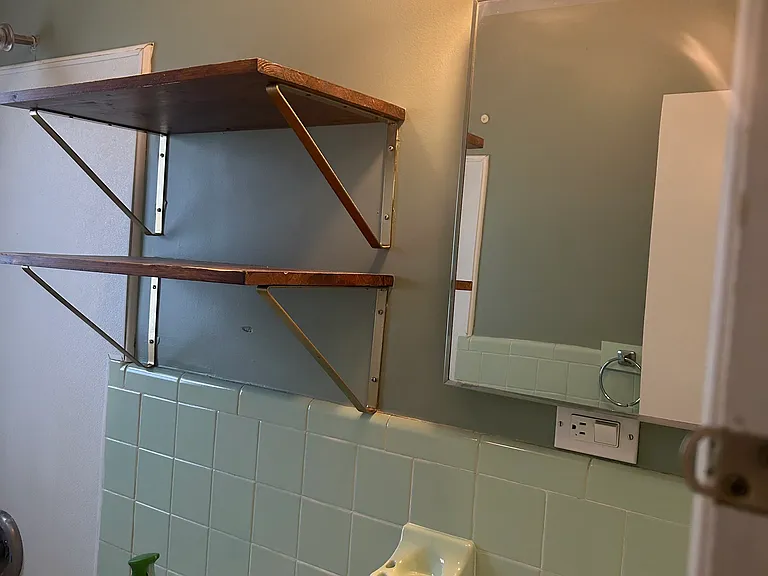 Bathroom with tub/shower. NOTE: tub is scheduled to be refinished 7/8