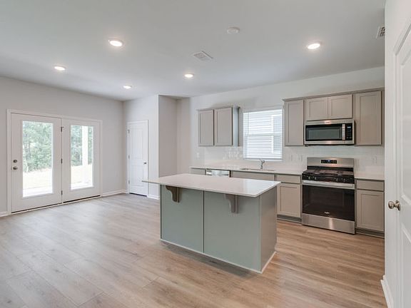 Open Cafe area off of the gathering room perfect for entertaining guest.