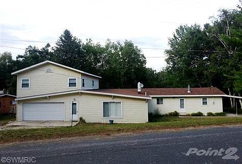 Large home with 7 bedrooms, 2 baths and 104' of waterfront!