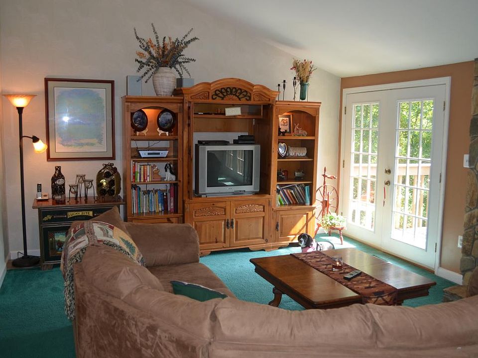Large Living room with decks to water