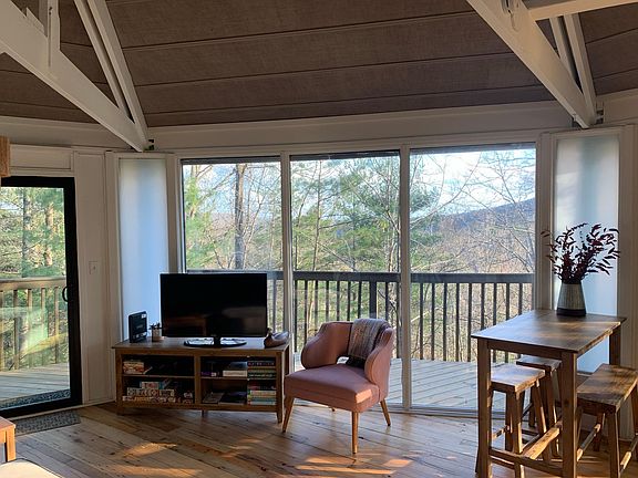 Living area with seasonal mountain views