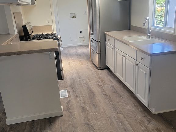 Stainless steel fixtures and appliances.